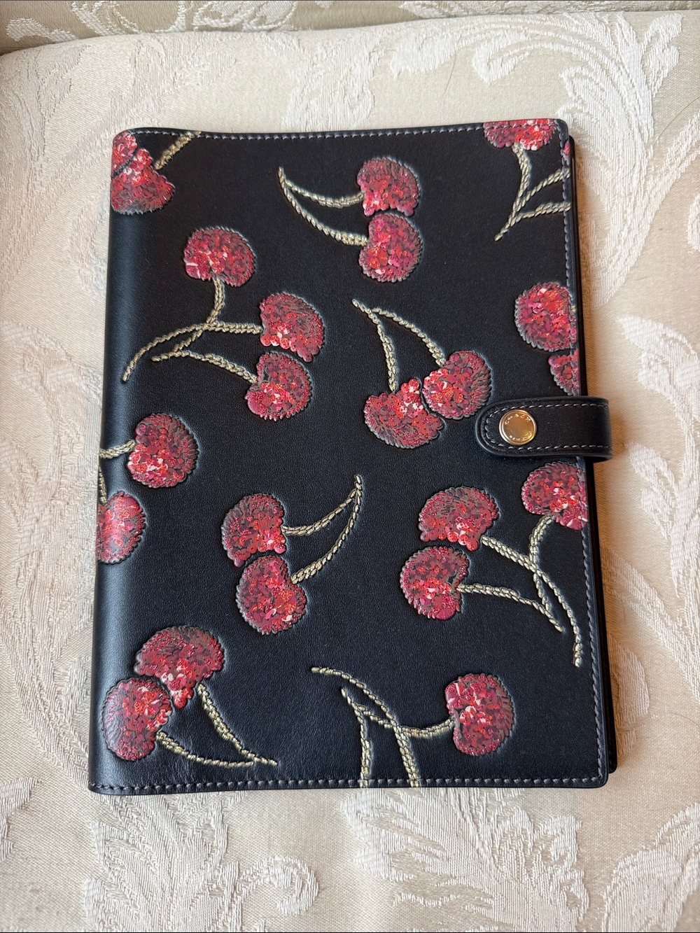 Coach Black Leather Notebook Cover with Red Cherries